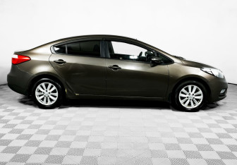 Подержанный автомобиль Kia Cerato Sedan 2014 года (4 фото)