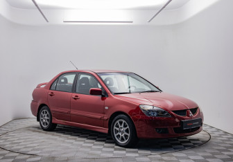 Подержанный автомобиль Mitsubishi Lancer Sedan 2004 года (3 фото)
