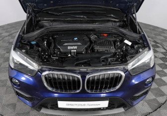 Подержанный автомобиль BMW X1 2017 года (10 фото)