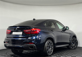 Подержанный автомобиль BMW X6 2018 года (2 фото)