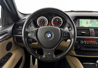 Подержанный автомобиль BMW X6 M 2011 года (21 фото)