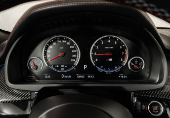 Подержанный автомобиль BMW X6 M 2015 года (13 фото)