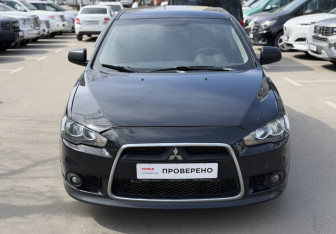 Подержанный автомобиль Mitsubishi Lancer Sedan 2011 года (2 фото)