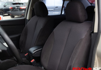 Подержанный автомобиль Nissan Tiida Sedan 2011 года (12 фото)