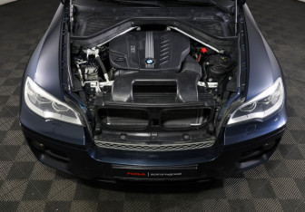 Подержанный автомобиль BMW X6 2013 года (9 фото)