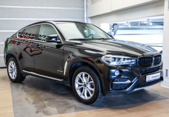 Подержанный автомобиль BMW X6 2016 года (2 фото)