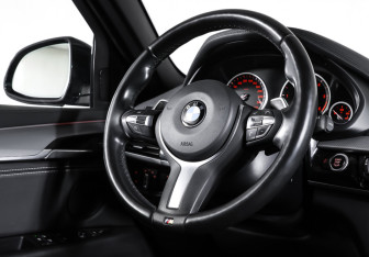 Подержанный автомобиль BMW X6 2018 года (13 фото)