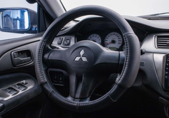 Подержанный автомобиль Mitsubishi Lancer Wagon 2006 года (15 фото)