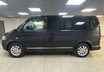 Подержанный автомобиль Volkswagen Multivan 2013 года (8 фото)