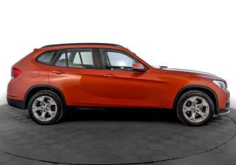 Подержанный автомобиль BMW X1 2014 года (4 фото)