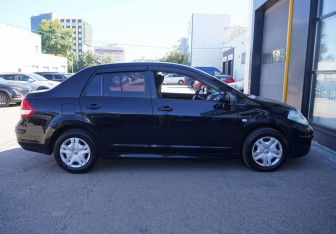 Подержанный автомобиль Nissan Tiida Sedan 2011 года (4 фото)