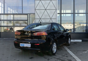 Подержанный автомобиль Mitsubishi Lancer Sedan 2008 года (5 фото)