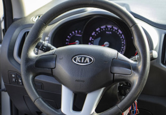 Подержанный автомобиль Kia Sportage 2012 года (12 фото)