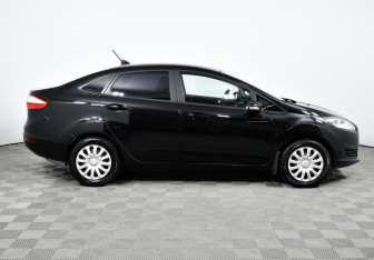 Подержанный автомобиль Ford Fiesta Sedan 2017 года (4 фото)