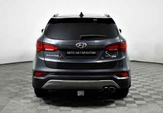 Подержанный автомобиль Hyundai Santa Fe 2016 года (4 фото)