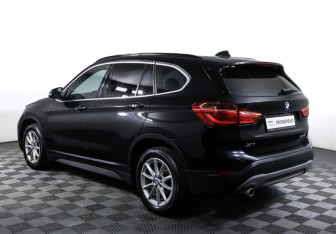 Подержанный автомобиль BMW X1 2018 года (7 фото)