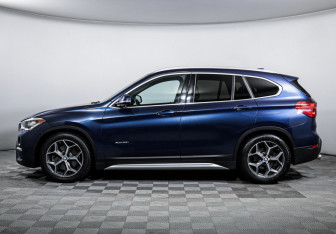 Подержанный автомобиль BMW X1 2015 года (8 фото)