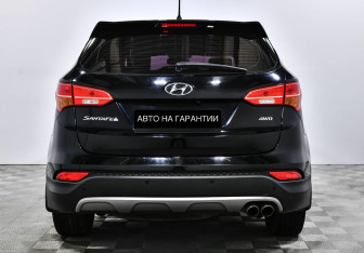 Подержанный автомобиль Hyundai Santa Fe 2014 года (4 фото)