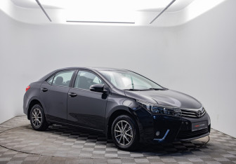 Подержанный автомобиль Toyota Corolla Sedan 2014 года (3 фото)