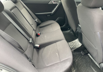 Подержанный автомобиль Kia Cerato Sedan 2012 года (11 фото)