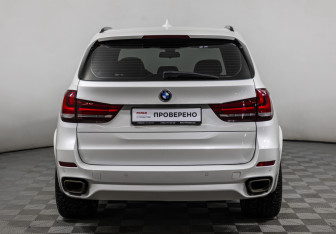 Подержанный автомобиль BMW X5 2014 года (6 фото)