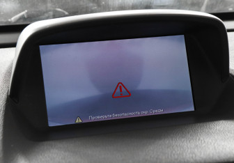 Подержанный автомобиль Opel Mokka 2014 года (13 фото)