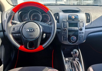 Подержанный автомобиль Kia Cerato Sedan 2012 года (13 фото)