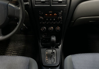 Подержанный автомобиль Nissan Almera Classic 2013 года (13 фото)