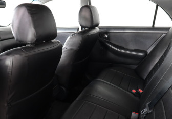 Подержанный автомобиль Toyota Corolla Sedan 2004 года (12 фото)
