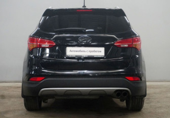 Подержанный автомобиль Hyundai Santa Fe 2015 года (7 фото)