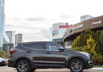 Подержанный автомобиль Hyundai Santa Fe 2015 года (3 фото)