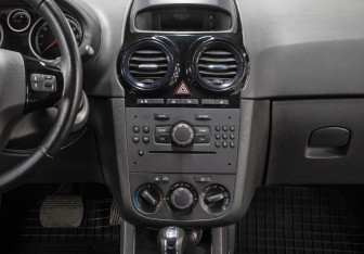 Подержанный автомобиль Opel Corsa 2008 года (15 фото)