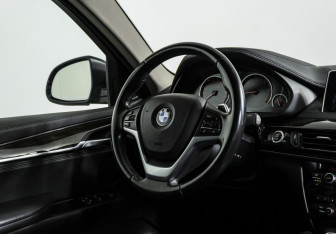 Подержанный автомобиль BMW X6 2016 года (10 фото)