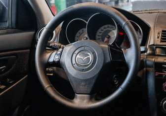 Подержанный автомобиль Mazda 3 Sedan 2008 года (11 фото)