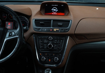 Подержанный автомобиль Opel Mokka 2013 года (12 фото)