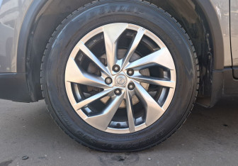 Подержанный автомобиль Nissan X-Trail 2015 года (9 фото)