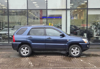 Подержанный автомобиль Kia Sportage 2010 года (4 фото)