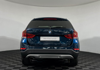 Подержанный автомобиль BMW X1 2014 года (4 фото)