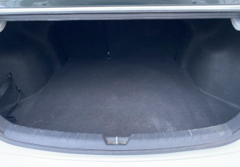 Подержанный автомобиль Kia Rio Sedan 2017 года (13 фото)