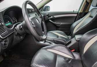 Подержанный автомобиль Saab 9-3 Sedan 2008 года (10 фото)