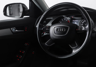 Подержанный автомобиль Audi A4 Sedan 2014 года (12 фото)