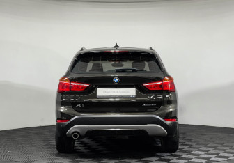 Подержанный автомобиль BMW X1 2018 года (4 фото)