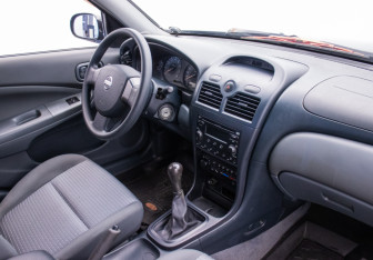 Подержанный автомобиль Nissan Almera Classic 2007 года (10 фото)