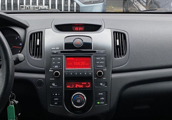 Подержанный автомобиль Kia Cerato Sedan 2012 года (11 фото)