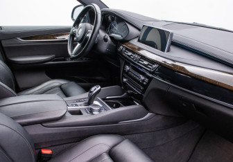 Подержанный автомобиль BMW X6 2018 года (10 фото)