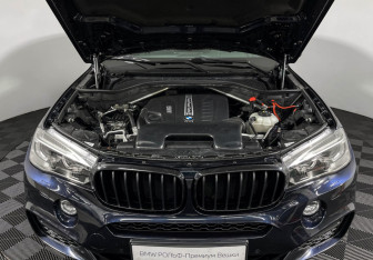 Подержанный автомобиль BMW X6 2018 года (10 фото)