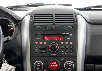 Подержанный автомобиль Suzuki Grand Vitara 2014 года (17 фото)