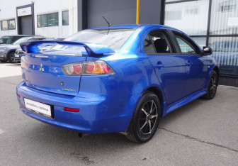 Подержанный автомобиль Mitsubishi Lancer Sedan 2011 года (5 фото)