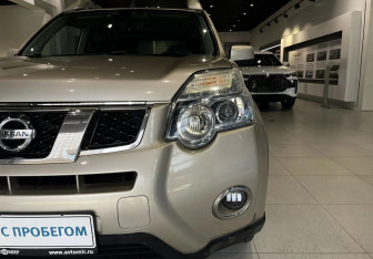 Подержанный автомобиль Nissan X-Trail 2012 года (9 фото)