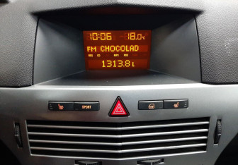 Подержанный автомобиль Opel Astra Wagon 2014 года (14 фото)